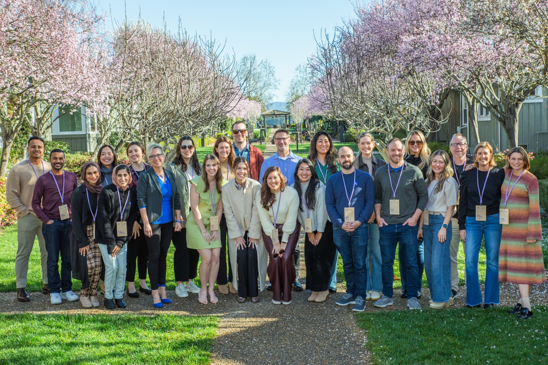 The cohort together in the gardens
